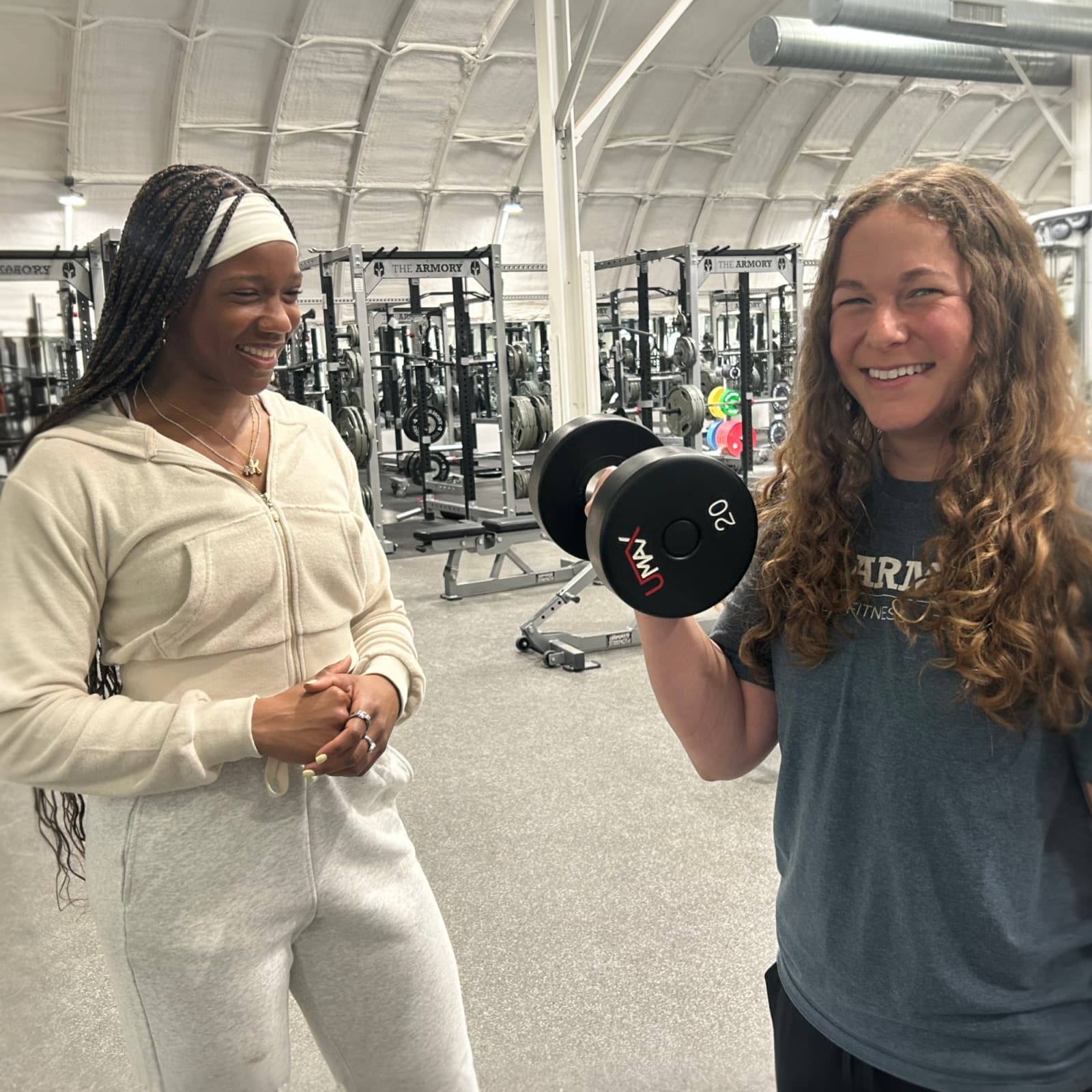 A personal trainer and client at THE ARMORY